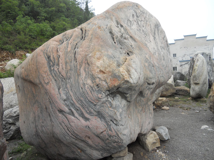 供應(yīng)湖北幻彩紅三峽浪園林景觀石三峽奇石觀賞石